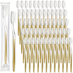 Un paquet de 50 brosses à dents jetables avec des poils mi-doux, des brosses à dents manuelles en nylon, emballées individuellement pour les voyages et les hôtels, adaptées aux soins bucco-dentaires des adultes.